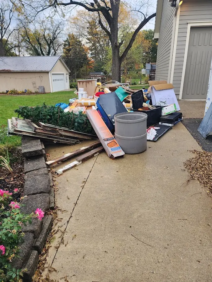 Dumpster being loaded with debris for 30 Yard Dumpster Rental in Ogdensburg